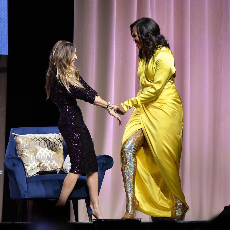 Michelle Obama’s dress showcased the thigh-high sequinned boots. Photograph: by Dia Dipasupil/Getty Images