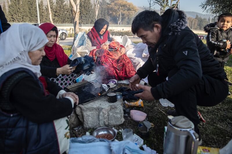 People cook in a park in Hatay, Turkey. Photograph: Burak Kara/Getty Images