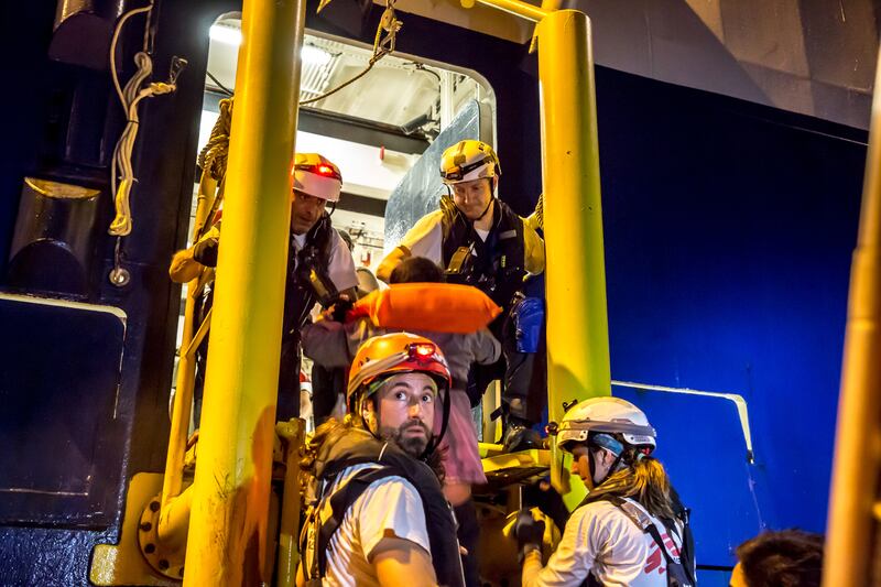 People are taken on board the Geo Barents during a rescue operation. Photograph: Sally Hayden