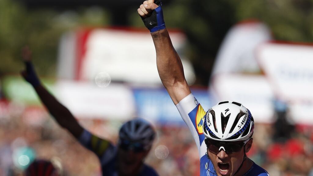 Yves Lampaert celebrates his victory in the second stage of La Vuelta. Photograph: Javier Lizon/EPA