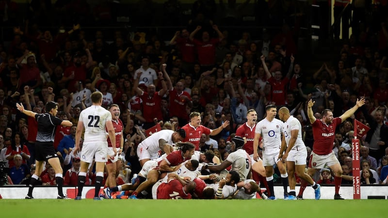 Wales celebrate at the full-time whistle after their win over England, which sends them to top spot in the world rnakings. Photograph: Rebecca Naden/Reuters