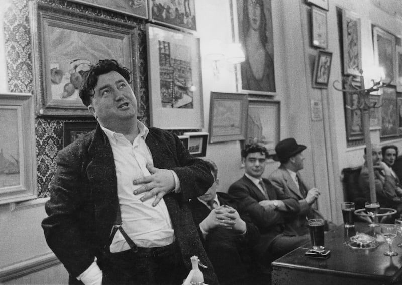 Brendan Behan in a London pub in 1956, the night after he did a drunken interview with Malcolm Muggeridge on the BBC television programme Panorama. Photograph: Haywood Magee/Picture Post/Getty