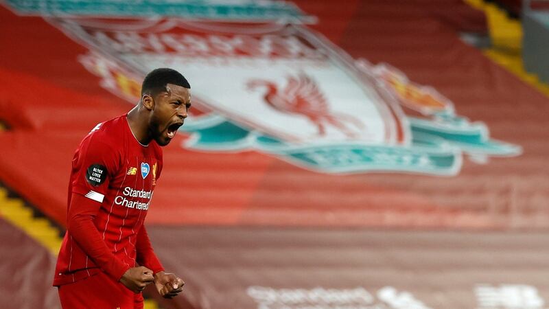 Liverpool’s Georginio Wijnaldum celebrates scoring his side’s third goal during the Premier League match against Chelsea at Anfield. Photograph: Phil Noble/PA Wire