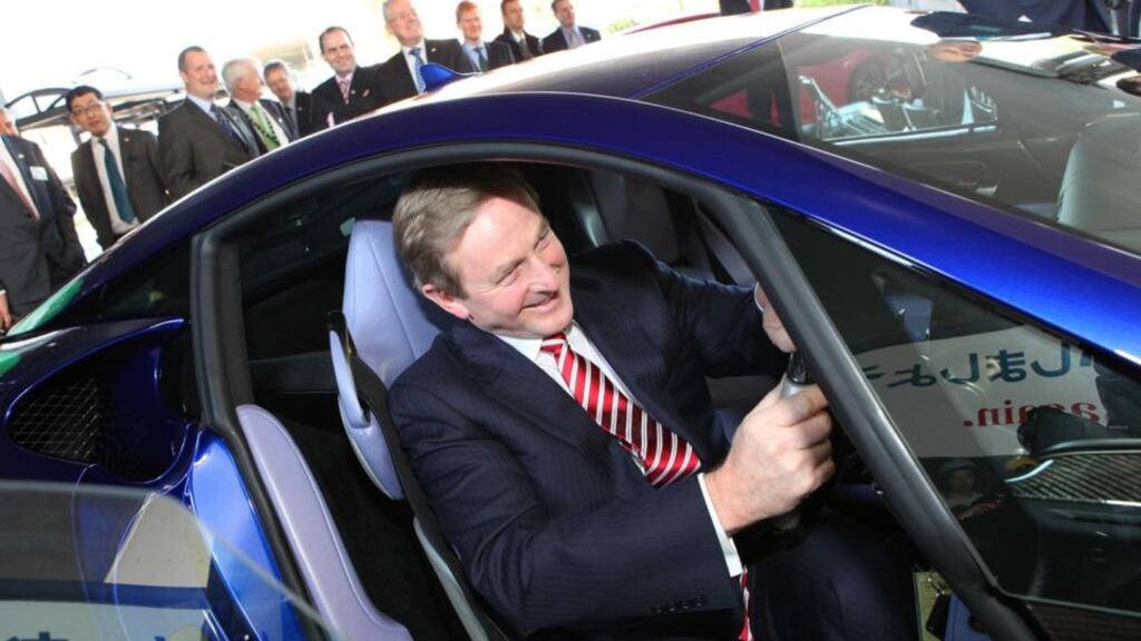 Taoiseach Enda Kenny checks out a car at the Toyota plant