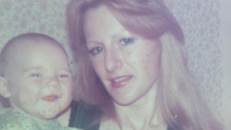 Gabrielle holding Tanya as a baby