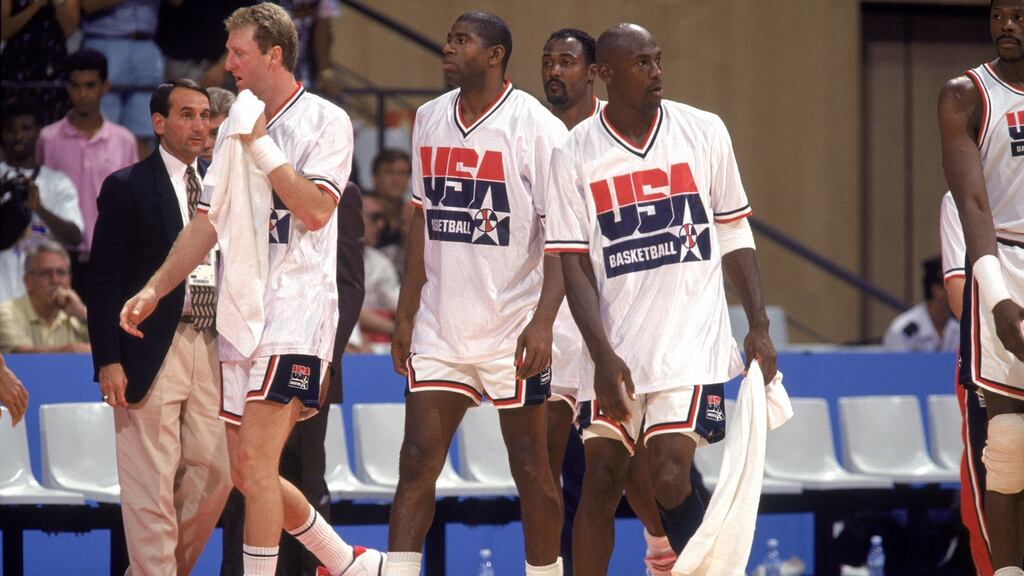 Larry Bird, Magic Johnson, Michael Jordan and Karl Malone (behind) walk on to court at the 1992 Barcelona Olympics for the USA’s game against Angola. Photograph: Mike Powell/Getty Images
