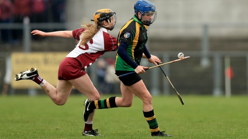 Slaughtneil’s Aoife Cassidy tackles Jenny Grace of Burgess Duharra (Tipperary) during the All-Ireland senior club camogie semi-final at Iniskeen, Co Monaghan. Photograph: Donall Farmer/Inpho