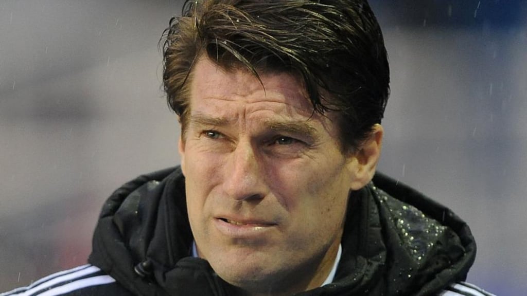 Michael Laudrup has strongly criticised the manner of his sacking by Swansea and has said he is taking legal advice over the dismissal.