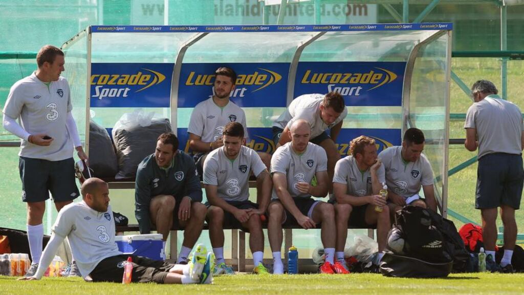 Ireland players rest after training in Malahide. Photograph: Lorraine O’Sullivan/Inpho