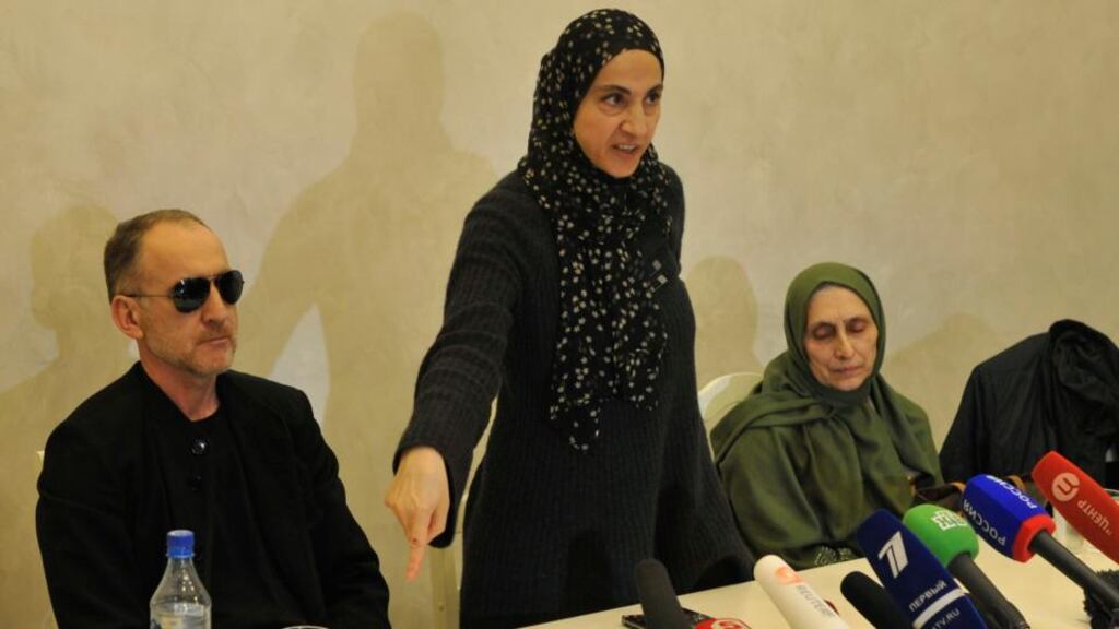 Zubeidat Tsarnaeva (centre), the mother of the suspected Boston bombers, speaks to reporters while the father Anzor Tsarnaev and aunt Patimat Suleymanova look on, in Makhachkala, Dagestan. Photograph: Sergey Rassulov/Getty