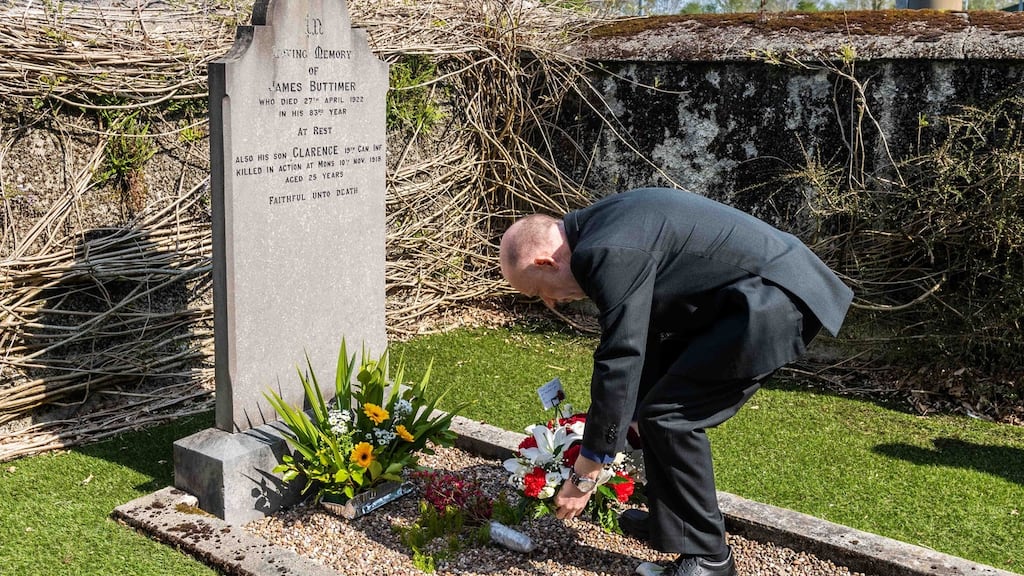 Greg Alexander, Methodist Minister, lays a wreath on the grave of 82-year-old victim James Buttimer marking 100th Anniversary of the Bandon Valley killings. Photograph: Andy Gibson