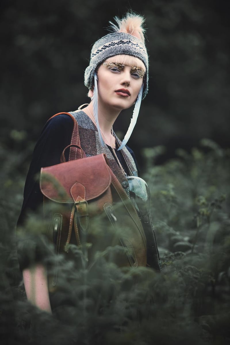 Nepal knit headband €12, bohemian dres €45, leather rucksack €85 all from Casa Crafts Cork. Vintage tweed waistcoat €100 from The Retro Workshop, Cork. Glass pendant, Mary Ginnifer Designs. Jeans €68 from Topshop, Opera Lane, Cork.