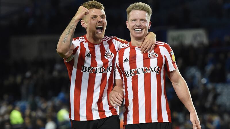 Max Power and Grant Leadbitter celebrate Sunderland’s victory in the League One play-off semi-final against Portsmouth at Fratton Park. Photograph: Sunderland AFC/Sunderland AFC via Getty Images