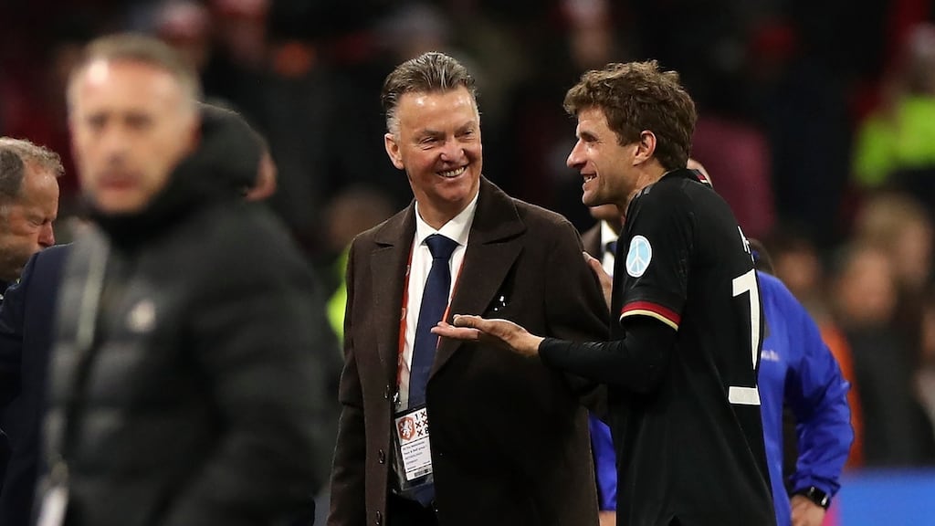 Netherlands’ manager Louis van Gaal chatting to Thomas Muller. Photograph: Friedemann Vogel/EPA