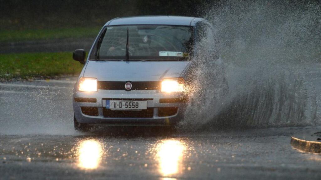 Heavy rain caused flooding on the Swords Road in Co Dublin this morning. Photographer: Dara Mac Dónaill/The Irish Times