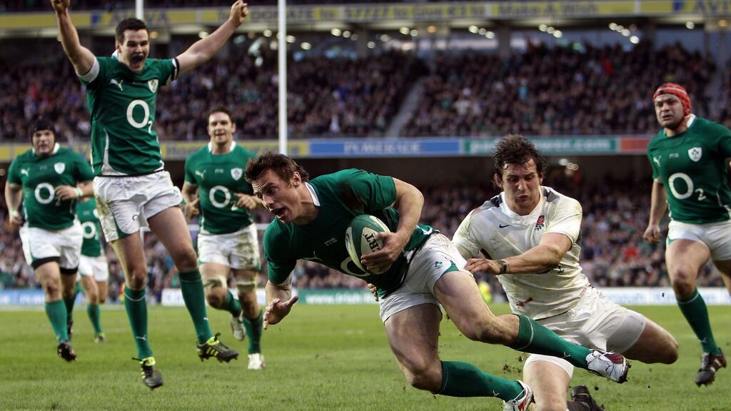 Ireland’s Tommy Bowe gets over the try line at the Aviva Stadium in a match which England lost to miss out on the 2011 grand slam. Photograph: Dan Sheridan/Inpho