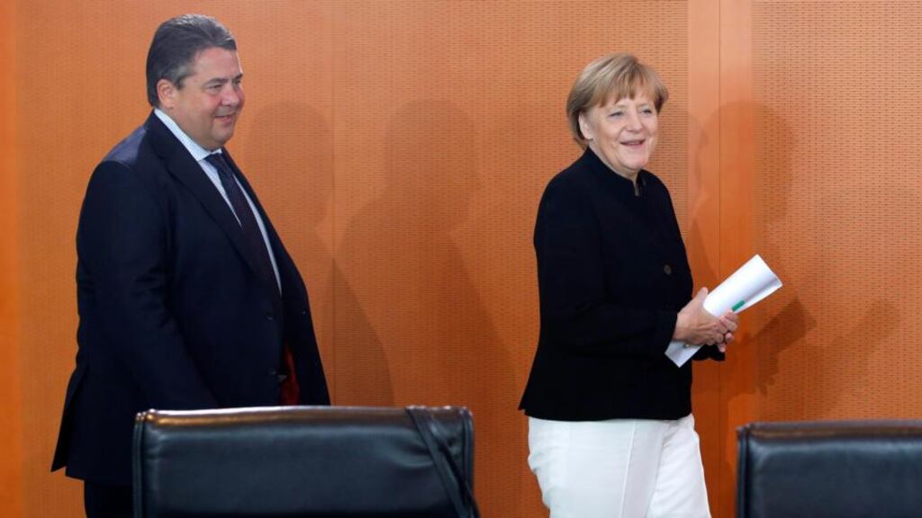 German Chancellor Angela Merkel and Economy Minister Sigmar Gabriel arrive for a cabinet meeting at the Chancellery in Berlin. Photograph: Fabrizio Bensch/Reuters
