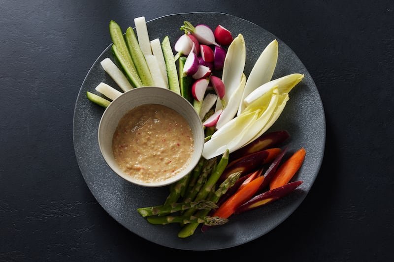 A spicy, umami-rich sauce featuring chao (fermented tofu) is wonderful alongside crudités. Photograph: Bobbi Lin/The New York Times
