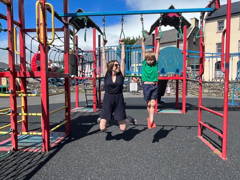 Mary Jennings attempts to keep up with son Harry in a fun playground challenge.