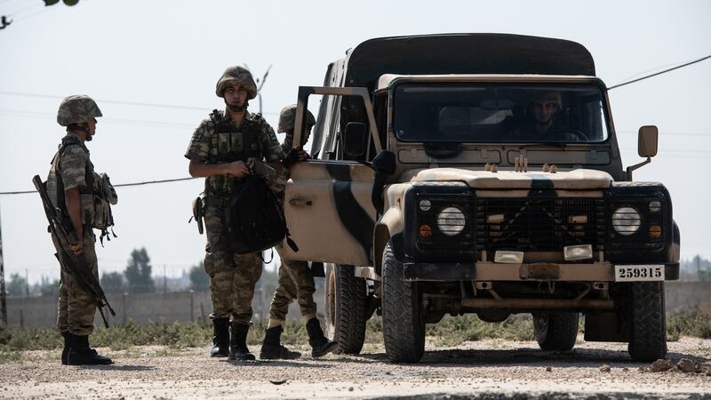 Turkish soldiers stand guarded in the Turkish side of the border between Turkey and Syria on Wednesday in Akcakale, Turkey. Photograph: Burak Kara/Getty Images