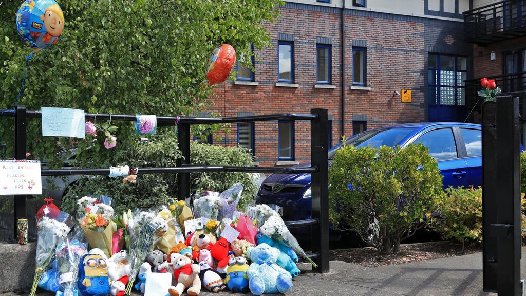 Flowers left at the entrance to the Riverside Apartments, Poddle Park, Kimmage. Photograph: Colin Keegan/Collins
