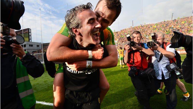 The best of times: Murphy and Jim McGuinness celebrating after winning the All-Ireland. Photo: Dara Mac Donaill/The Irish Times