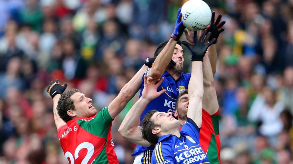 Kerry midfielders David Moran and Anthony Maher in action against Mayo last summer. Photograph: Cathal Noonan/Inpho
