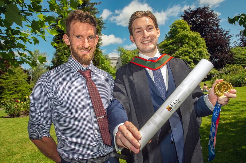 Paul O'Donovan with his brother Gary following his graduation with a Bachelor's Degree in Medicine from University College Cork. Photograph: Michael Mac Sweeney/Provision