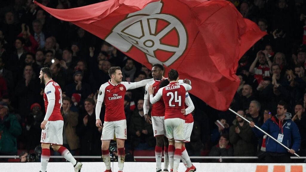 Arsenal celebrate scoring against AC Milan at the Emirates Stadium. Photograph: Shaun Botterill/Getty Images