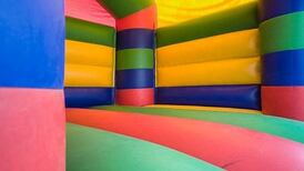 Girl (6) dies and six others hurt as bouncy castle blows away