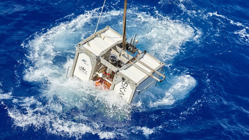 The Skaff lander floats next to the research vessel DSSV Pressure Drop above the Pacific Oceans’s Mariana Trench. Photograph: Atlantic Productions for Discovery Channel via Reuters.