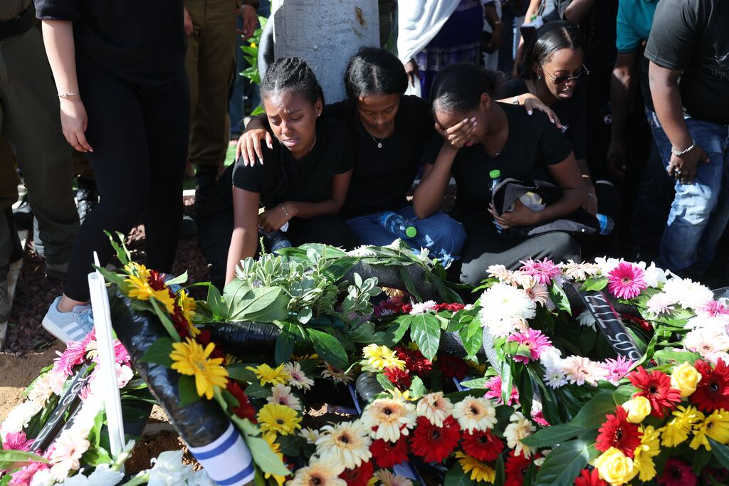 Relatives of Shahar Manoav, an Israeli soldier, mourn during his funeral in Ashkelon, Israel, on Wednesday. Photograph: Abir Sultan/EPA