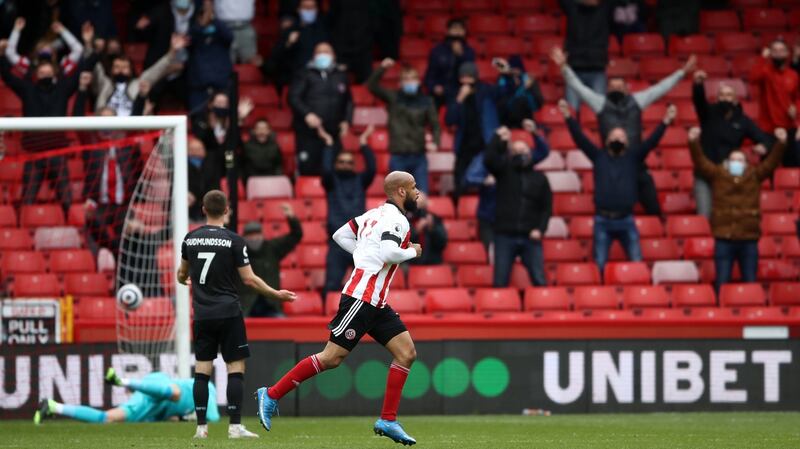 Sheffield United’s David McGoldrick celebrates after scoring his side’s winner against Burnley. Photograph: Tim Goode/PA