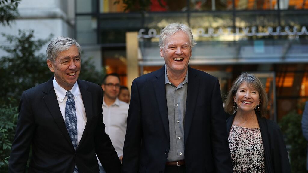 Rockefeller University biologist Michael Young (centre) walks on campus with his wife Laurel Eckhardt and university president Richard Lifton after winning the Nobel Prize in Physiology. Photograph: Spencer Platt/Getty Images