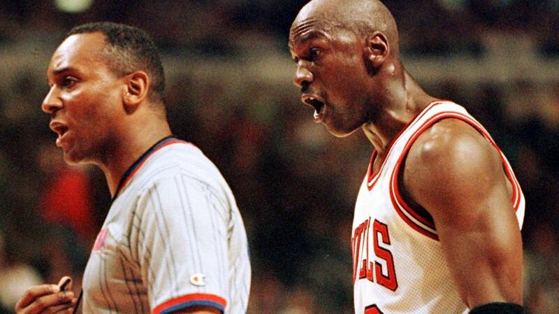 Michael Jordan argues with official Eddie Rush. Photograph: Jeff Haynes/AFP via Getty Images