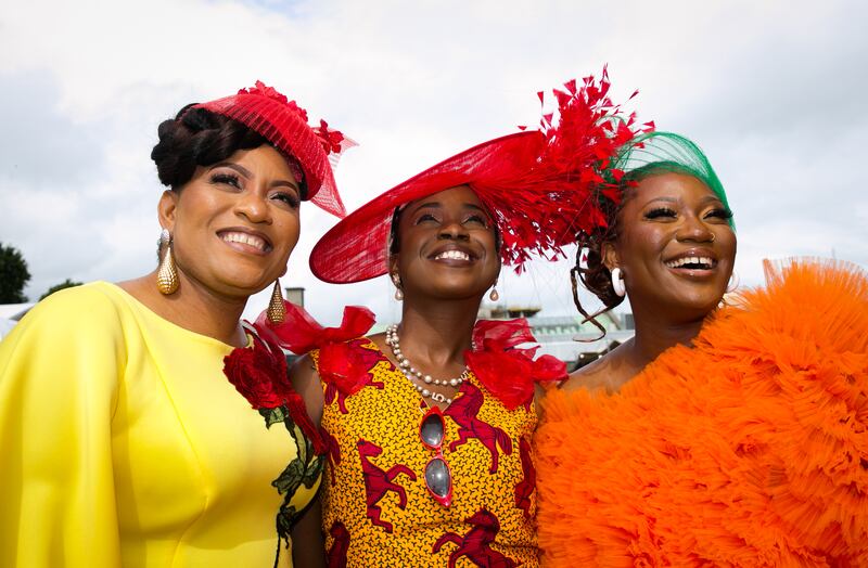 Temi Animashaun from Blanchardstown, Pearle Nwaezeigwe from Grand Canal and Oyindamola Animashaun from Blanchardstown during Ladies' Day at the RDS. Photograph: Gareth Chaney/Collins