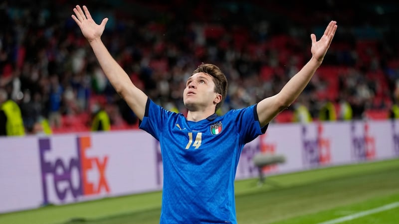 Italy’s Federico Chiesa celebrates after scoring his side’s crucial opener against Austria. Photograph: Frank Augstein/AP