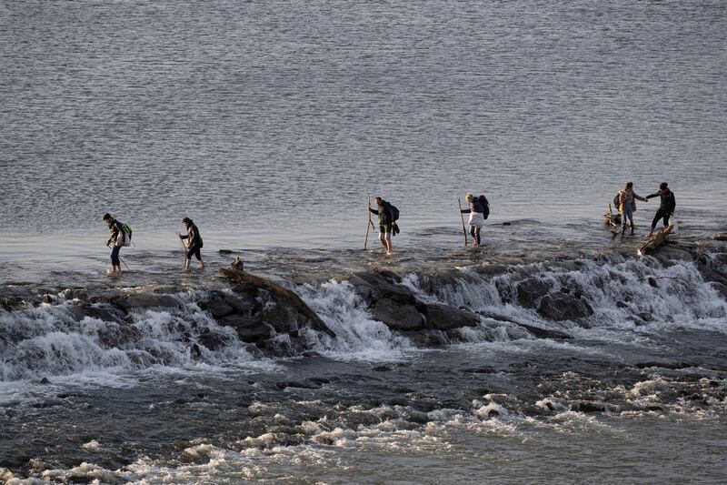 Migrants cross Meric river as they walk towards the Turkey’s Pazarkule border crossing with Greece’s Kastanies, near Edirne, Turkey on March 1st. Photograph: Marko Djurica/Reuters