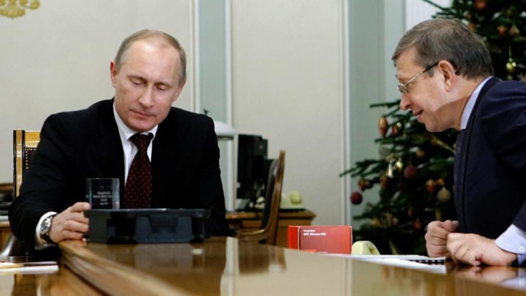 Russia’s president Vladimir Putin pictured in December 2010 with Sistema Holdings owner Vladimir Yevtushenkov. Photograph: AP