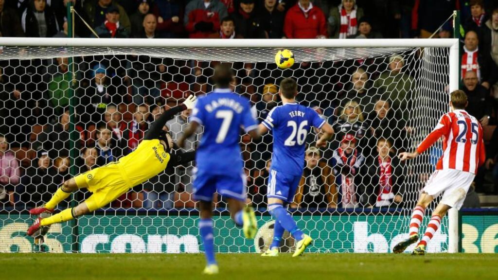 Petr Cech is unable to stop Oussama Assaidi’s strike as Peter Crouch looks on at the Britannia Stadium. Photograph: Andrew Winning/Reuters