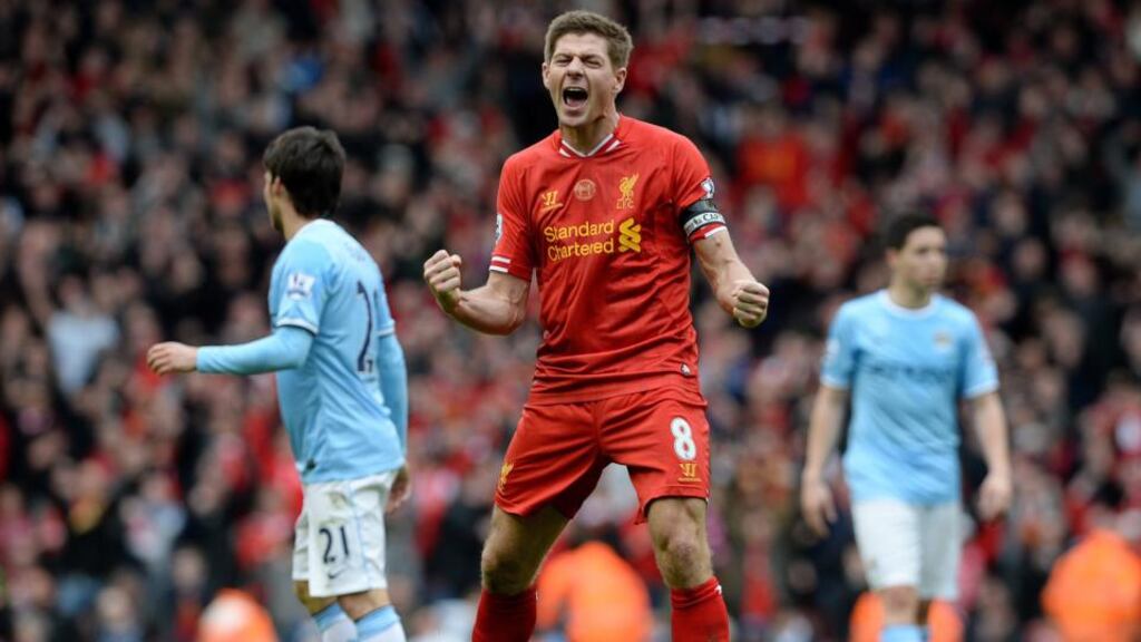 Liverpool captain  Steven Gerrard reacts at the final whistle after the 3-2 Premier league  victory over  Manchester City at Anfield. Photograph: Peter Powell/EPA