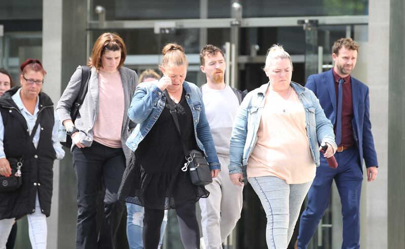 Diane Dunne, mother of Josh Dunne, leaving the court with family and friends after George Gonzaga Bento was acquitted of her son's murder. Photograph: Collins Courts