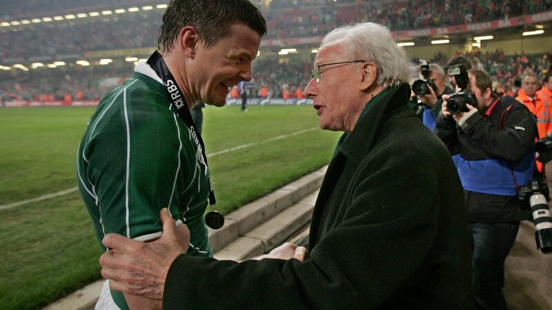 Brian O’Driscoll celebrates with Jack Kyle after the victory over Wales which secured Ireland the Grand Slam at the Millennium Stadium in Cardiff in March 2009. Photograph: Morgan Treacy/Inpho
