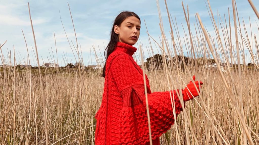 Oversize hand-crochet wave stitch red sweater with caped sleeves by Colin Burke, €1,295.