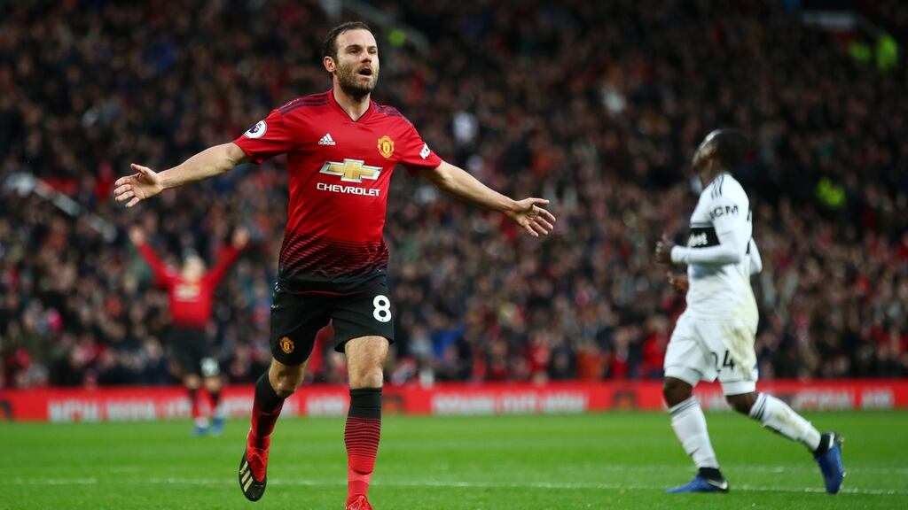 Manchester United’s  Juan Mata   celebrates after scoring his team’s second goal in their 4-1 win over Fulham. Photograph:   Clive Brunskill/Getty Images