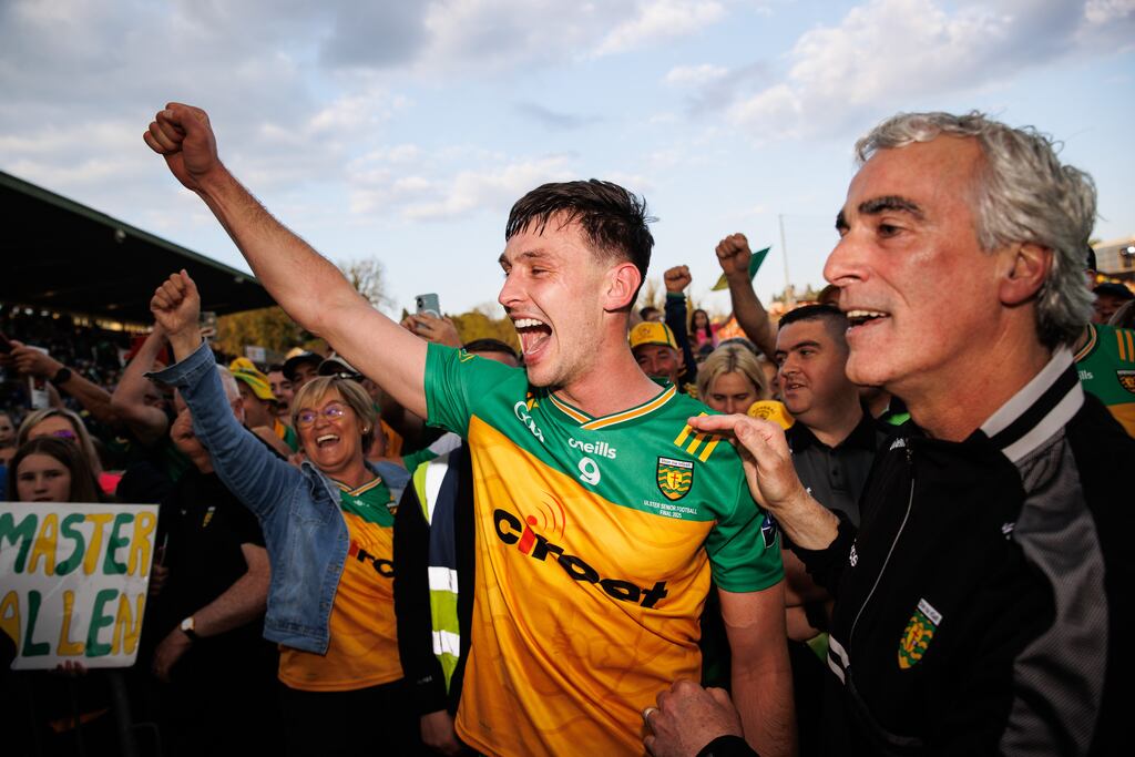 Donegal's Michael Langan celebrates with manager Jim McGuinness. Photograph: Ben Brady/Inpho