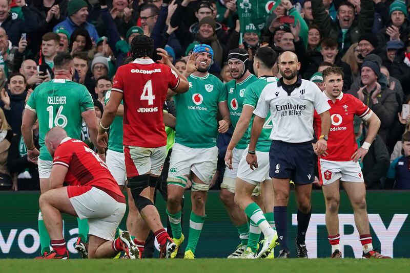 Ireland's Tadhg Beirne celebrates with team-mates after scoring the bonus-point try at the end of the Six Nations match with Wales. Photograph: Brian Lawless/PA Wire