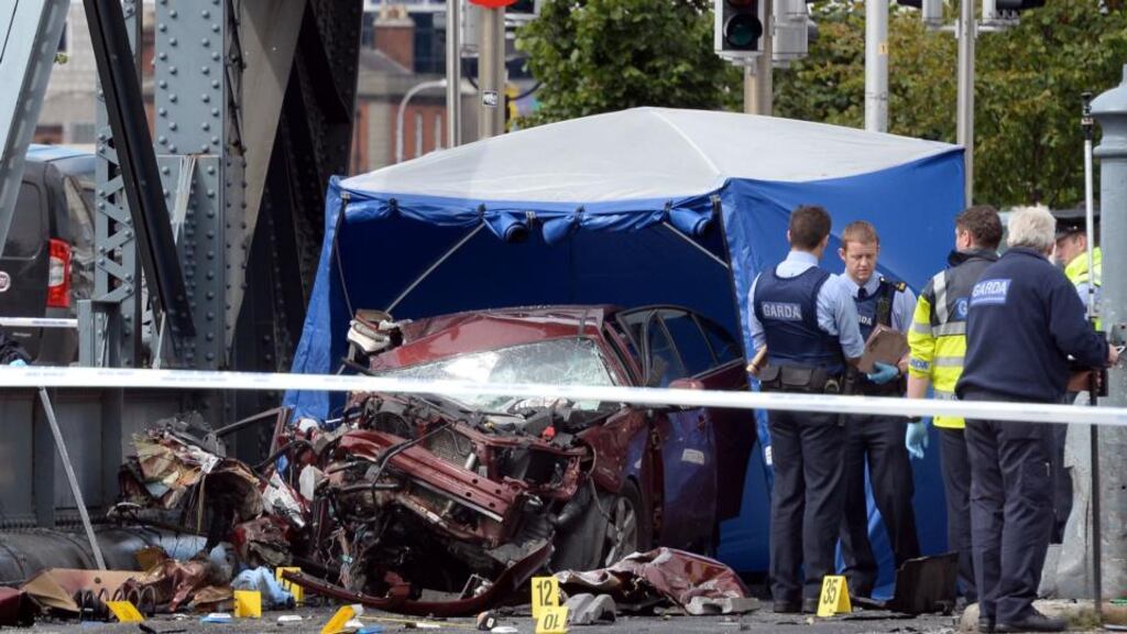 The scene of the crash on Monday where a hijacked taxi crashed at the North Wall killing two of the three occupants. Photograph: Brenda Fitzsimons/The Irish Times