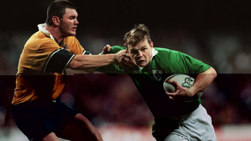 Brian O’Driscoll holds off Daniel Herbert of Australia on his Irish debut in 1999. Photograph: Patrick Bolger/Inpho