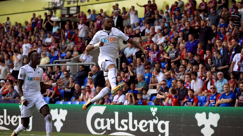 Jordan Ayew celebrates scoring Swansea City’s second goal against Crystal palace. Photograph: John Walton/PA
